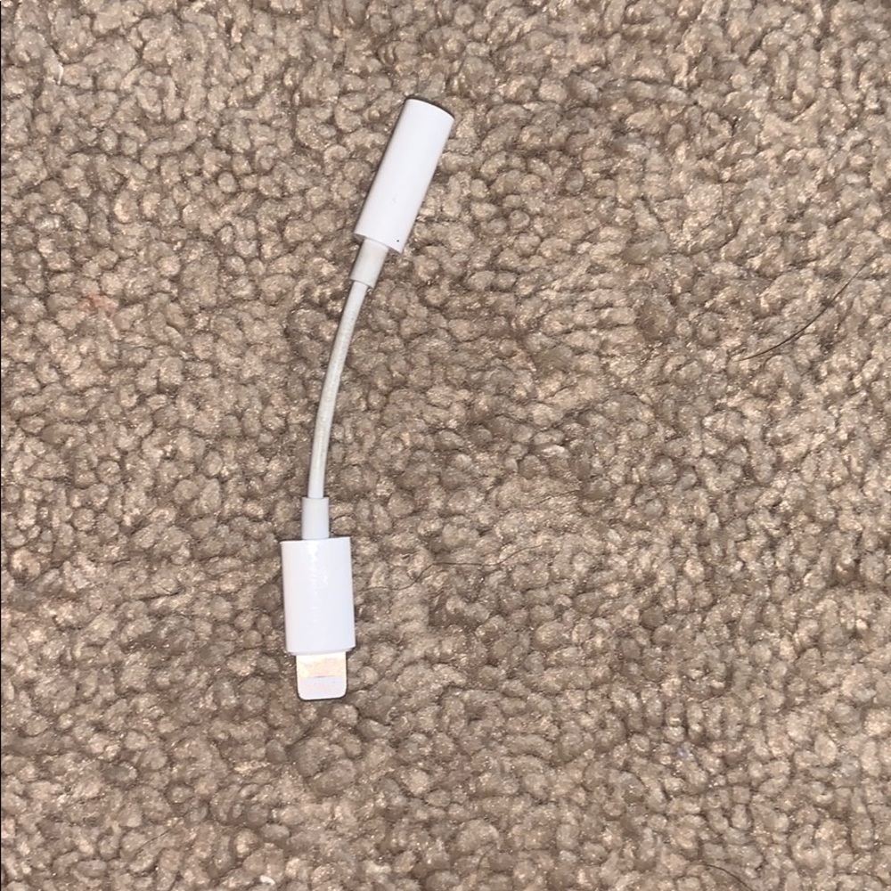 Apple dongle with a charging charm
